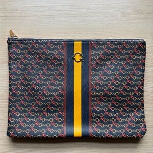 C. Wonder Navy and Yellow Patterned Clutch